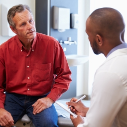 patient talking with his doctor